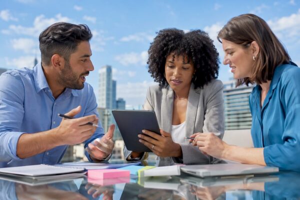 Legal PR team collaborating in conference room