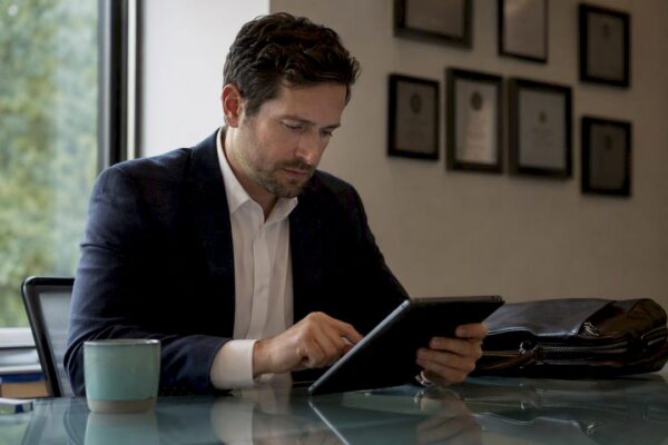 Lawyer organizing nomination on tablet