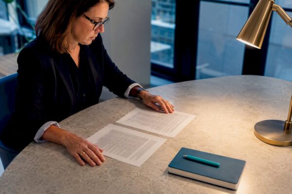 Editor reviewing legal press release drafts
