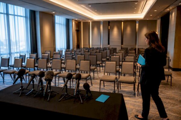 Press conference room prepared for reporters
